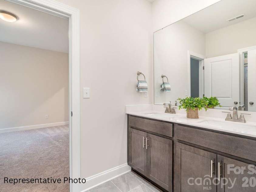 20396 Queens Street, Cornelius, NC 28031.  MLS# CAR4377185, YatesRealty ID 23579. 
