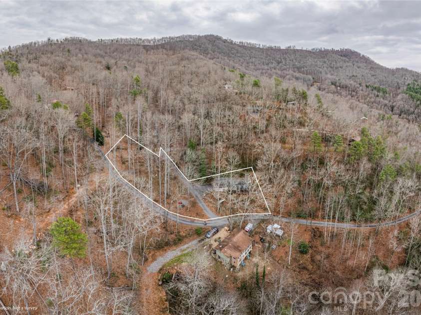 12 Bear Cove Lane, Bryson City, NC 28713.  MLS# CAR4337192, YatesRealty ID 2358. Drone view of lot with approximate lot lines