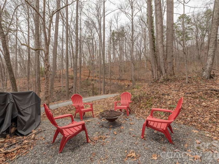 12 Bear Cove Lane, Bryson City, NC 28713.  MLS# CAR4337192, YatesRealty ID 2358. Enjoy the outdoors with the firepit and grill area