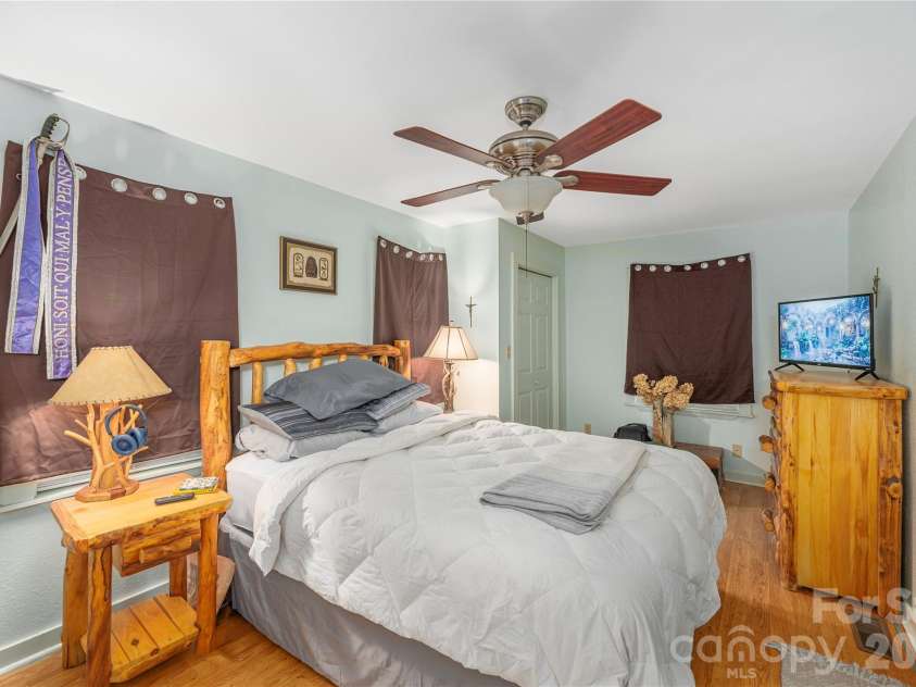 12 Bear Cove Lane, Bryson City, NC 28713.  MLS# CAR4337192, YatesRealty ID 2358. Primary bedroom