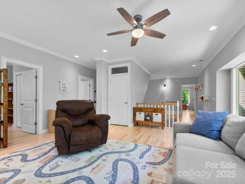 102 Gap Creek Road, Fletcher, NC 28732.  MLS# CAR4275624, YatesRealty ID 23580. 2nd Floor Living Room Facing 2nd Primary Bedroom Hallway, 3rd Bedroom and Bedroom/Office Pictured Left