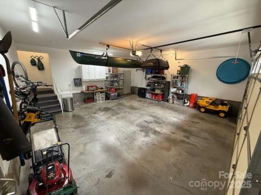 102 Gap Creek Road, Fletcher, NC 28732.  MLS# CAR4275624, YatesRealty ID 23580. Automatic Garage Door from Laundry Room Entrance