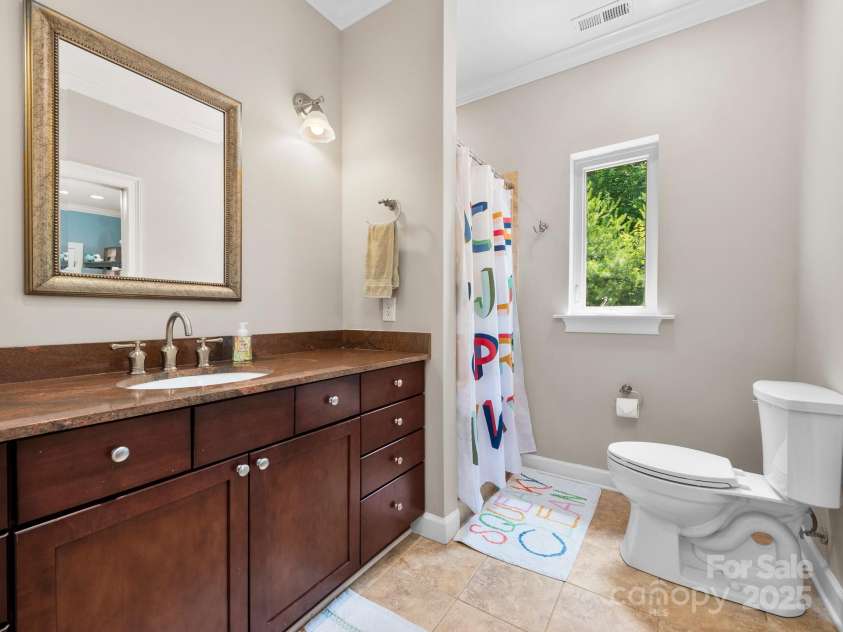 102 Gap Creek Road, Fletcher, NC 28732.  MLS# CAR4275624, YatesRealty ID 23580. Bathroom from 3rd Bathroom Shared w/ 2nd  Living Room