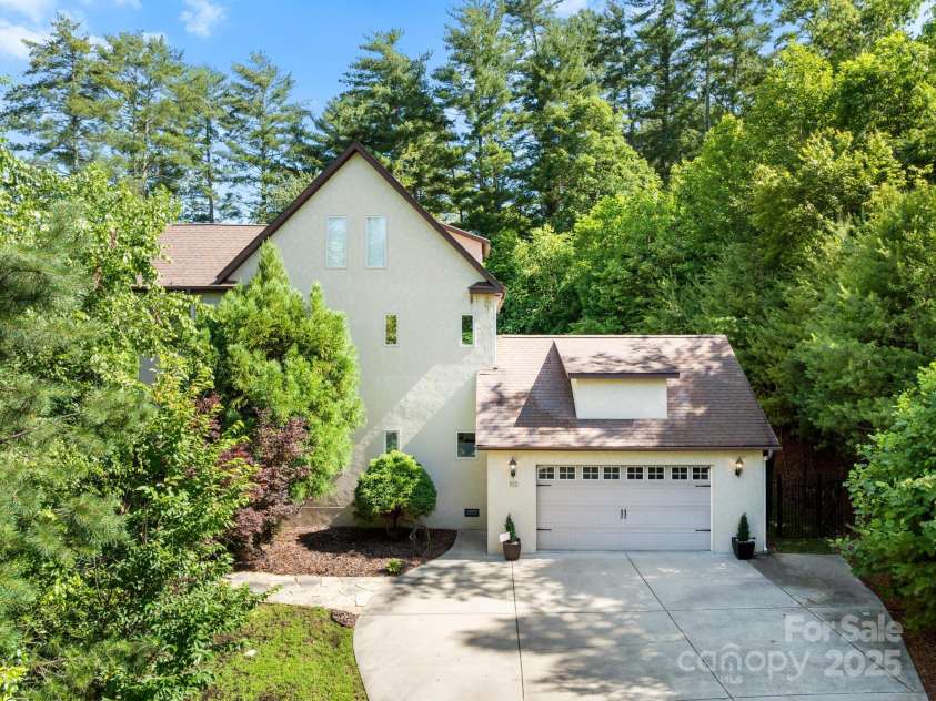 102 Gap Creek Road, Fletcher, NC 28732.  MLS# CAR4275624, YatesRealty ID 23580. Driveway and Garage Nestled by Natural Layers of Privacy