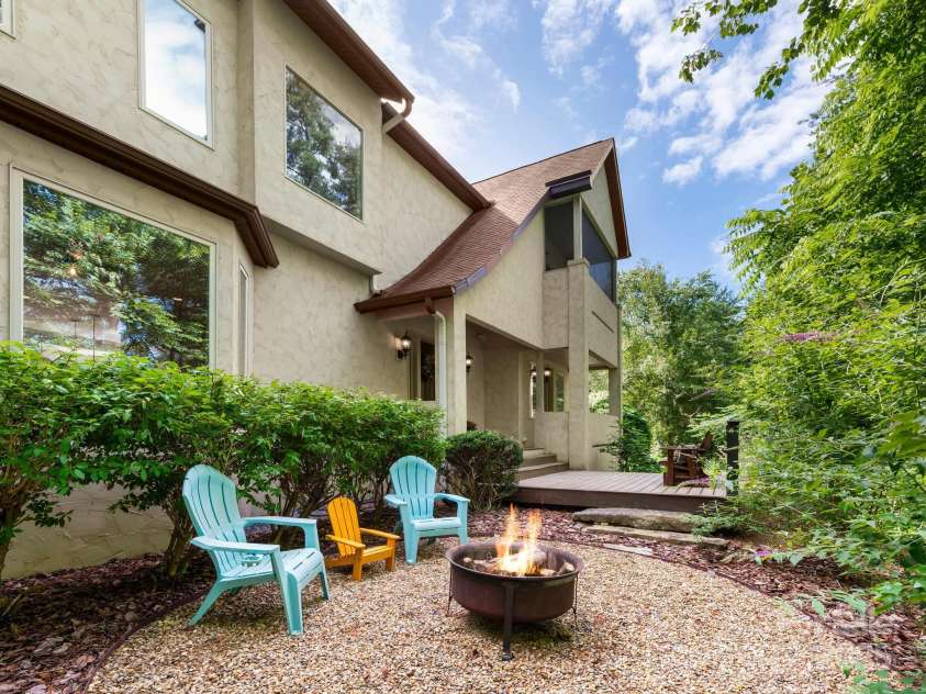 102 Gap Creek Road, Fletcher, NC 28732.  MLS# CAR4275624, YatesRealty ID 23580. Fire Pit and Front Port (From Backyard Gate Angle)