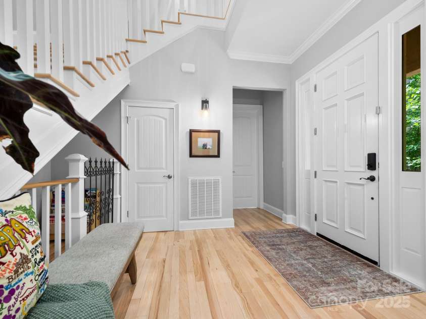 102 Gap Creek Road, Fletcher, NC 28732.  MLS# CAR4275624, YatesRealty ID 23580. Foyer, Half Bath, & Main Primary Hallway; Showcase The New Fully Interior Professional Paint Work