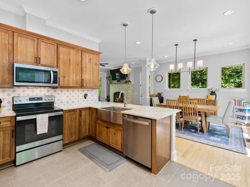 102 Gap Creek Road, Fletcher, NC 28732.  MLS# CAR4275624, YatesRealty ID 23580. New Farms Sink, Pendenant Lighting, Dinning Room Lighting and New Can Lighting Throughout