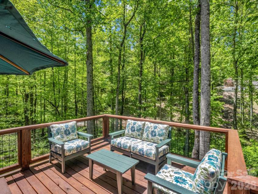135 Half Moon Lane, Brevard, NC 28712.  MLS# CAR4378080, YatesRealty ID 23583. 