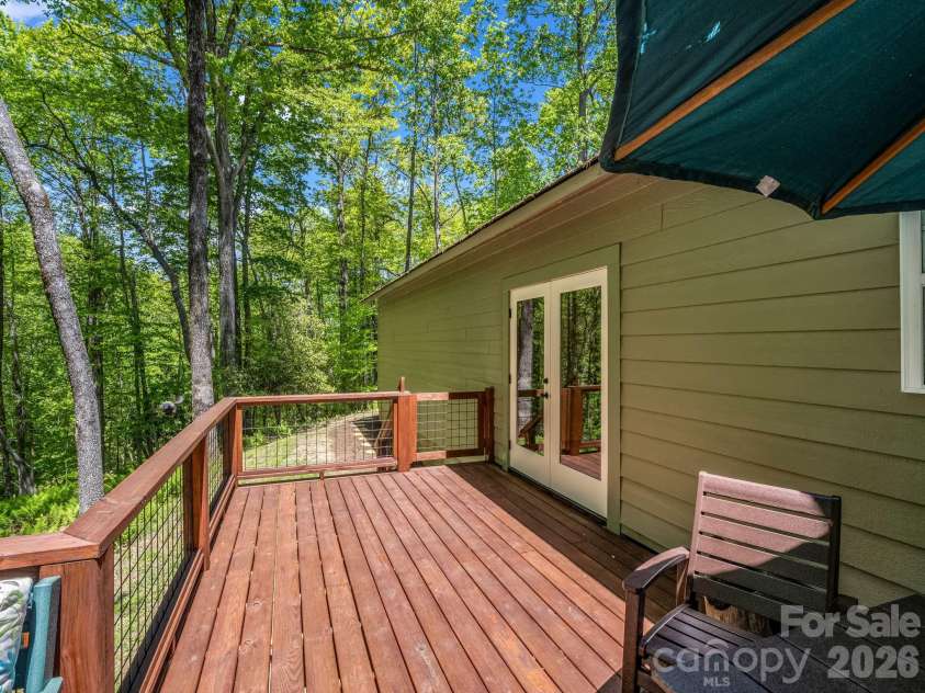 135 Half Moon Lane, Brevard, NC 28712.  MLS# CAR4378080, YatesRealty ID 23583. 
