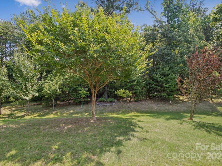 196 Hawks Creek Parkway, Fort Mill, SC 29708.  MLS# CAR4271545, YatesRealty ID 23591. Beautiful private wooded lot
