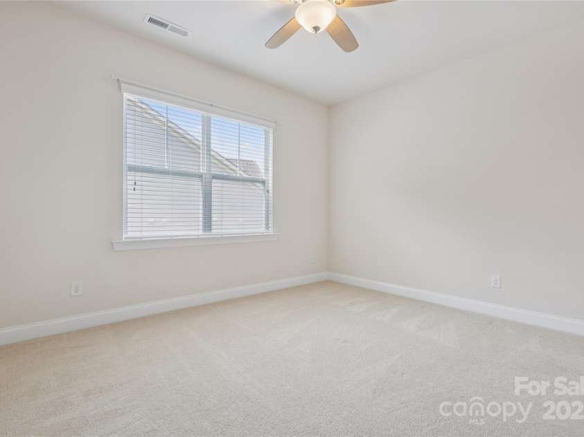196 Hawks Creek Parkway, Fort Mill, SC 29708.  MLS# CAR4271545, YatesRealty ID 23591. Bedroom 3 upstairs with ceiling fan