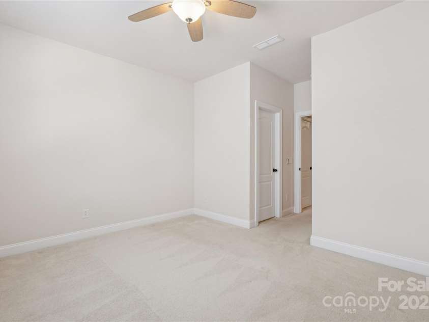 196 Hawks Creek Parkway, Fort Mill, SC 29708.  MLS# CAR4271545, YatesRealty ID 23591. Ceiling fan in spacious 4th bedroom