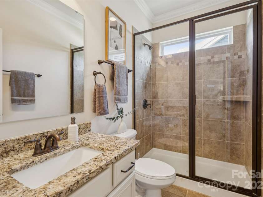 196 Hawks Creek Parkway, Fort Mill, SC 29708.  MLS# CAR4271545, YatesRealty ID 23591. Full bath with tiled shower