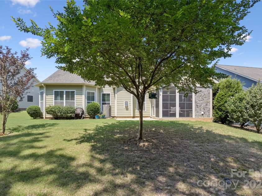 196 Hawks Creek Parkway, Fort Mill, SC 29708.  MLS# CAR4271545, YatesRealty ID 23591. Mature landscape on 0.23 acre lot