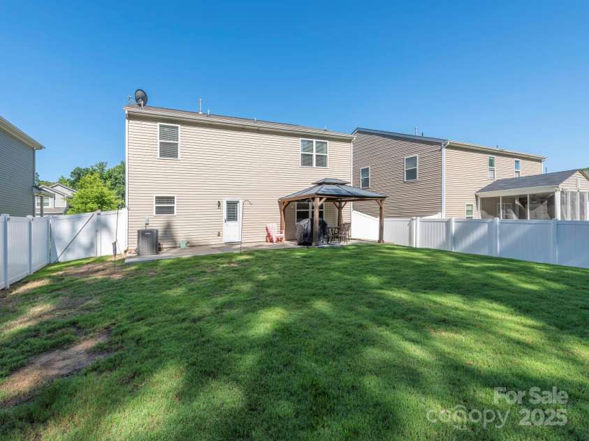 9123 Magnolia Lily Avenue, Charlotte, NC 28227.  MLS# CAR4272877, YatesRealty ID 23592. Backyard