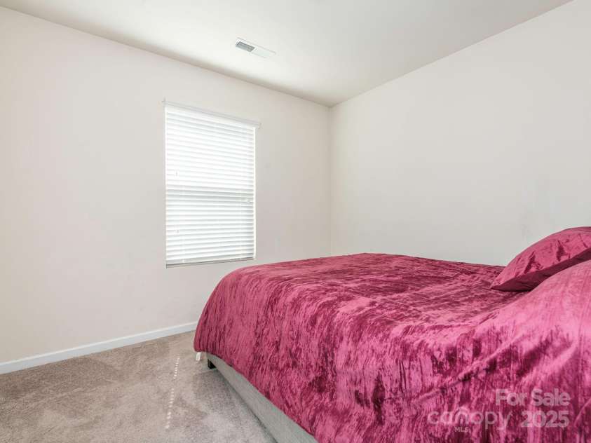 9123 Magnolia Lily Avenue, Charlotte, NC 28227.  MLS# CAR4272877, YatesRealty ID 23592. Bedroom 3