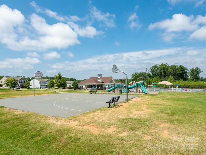 9123 Magnolia Lily Avenue, Charlotte, NC 28227.  MLS# CAR4272877, YatesRealty ID 23592. Community Game courts