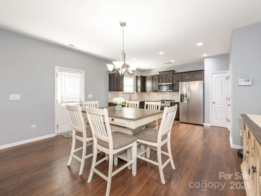 9123 Magnolia Lily Avenue, Charlotte, NC 28227.  MLS# CAR4272877, YatesRealty ID 23592. Dining area into Kitchen