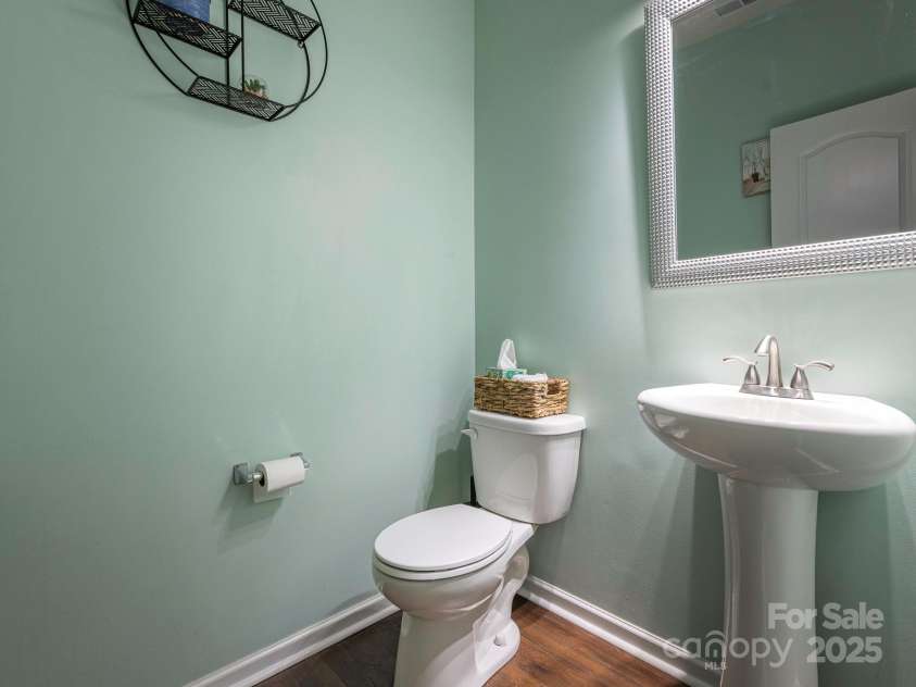 9123 Magnolia Lily Avenue, Charlotte, NC 28227.  MLS# CAR4272877, YatesRealty ID 23592. Main level half bath