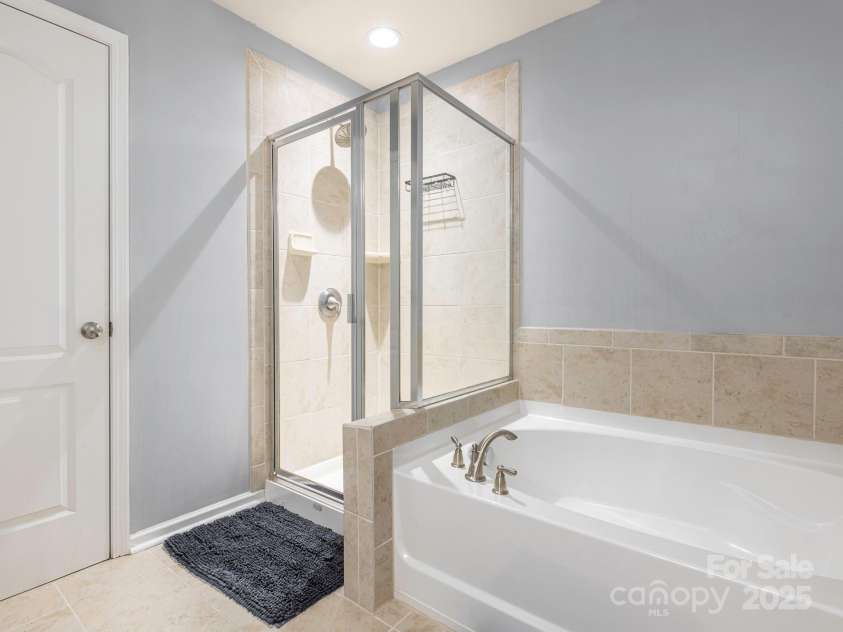9123 Magnolia Lily Avenue, Charlotte, NC 28227.  MLS# CAR4272877, YatesRealty ID 23592. Primary Bathroom