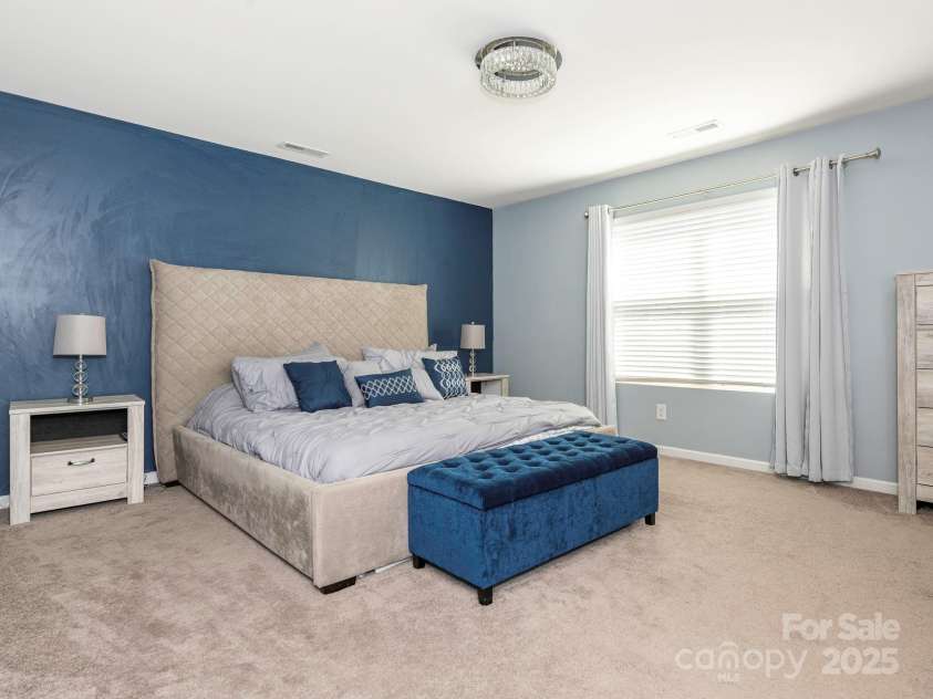 9123 Magnolia Lily Avenue, Charlotte, NC 28227.  MLS# CAR4272877, YatesRealty ID 23592. Primary Bedroom