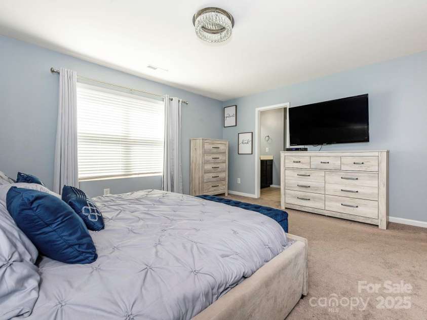 9123 Magnolia Lily Avenue, Charlotte, NC 28227.  MLS# CAR4272877, YatesRealty ID 23592. Primary Bedroom