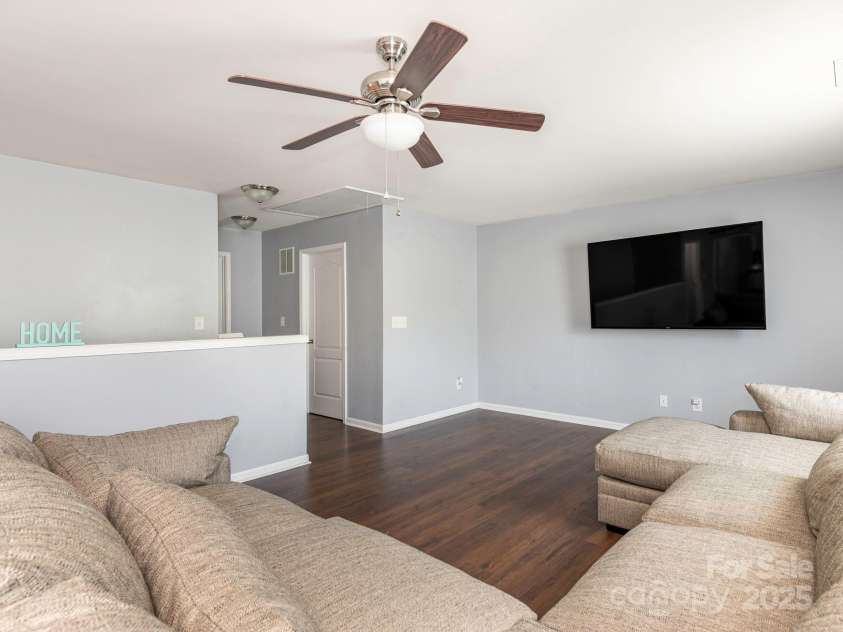 9123 Magnolia Lily Avenue, Charlotte, NC 28227.  MLS# CAR4272877, YatesRealty ID 23592. Upstairs loft landing