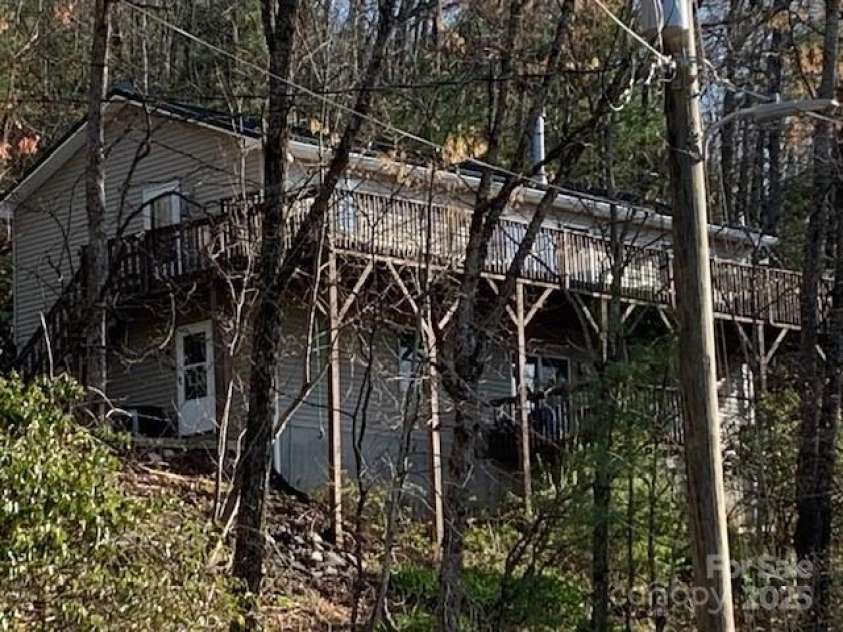 1474 HOLIDAY Drive, Hendersonville, NC 28739.  MLS# CAR4242849, YatesRealty ID 236. A FEW STEPS OUT OF FLAT ROCK 