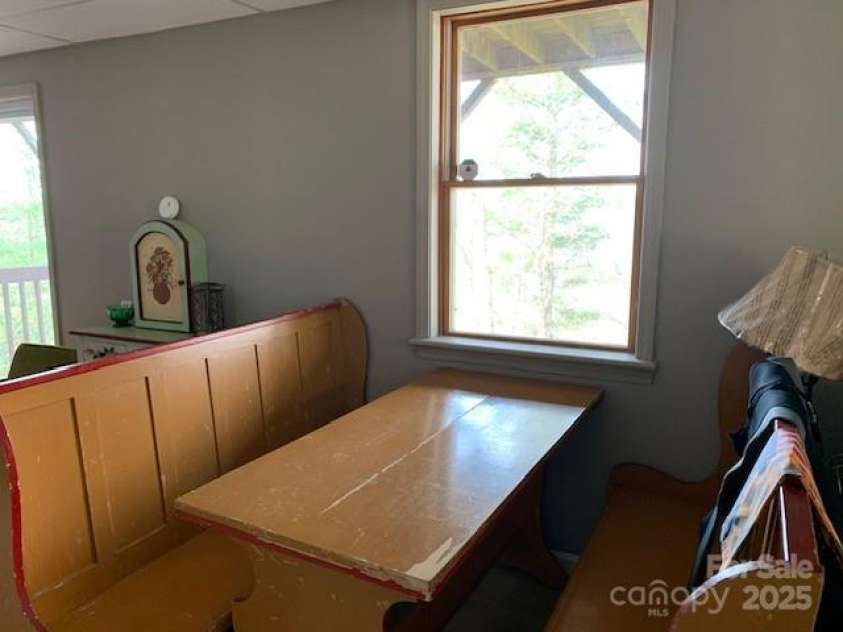1474 HOLIDAY Drive, Hendersonville, NC 28739.  MLS# CAR4242849, YatesRealty ID 236. Antique dining area