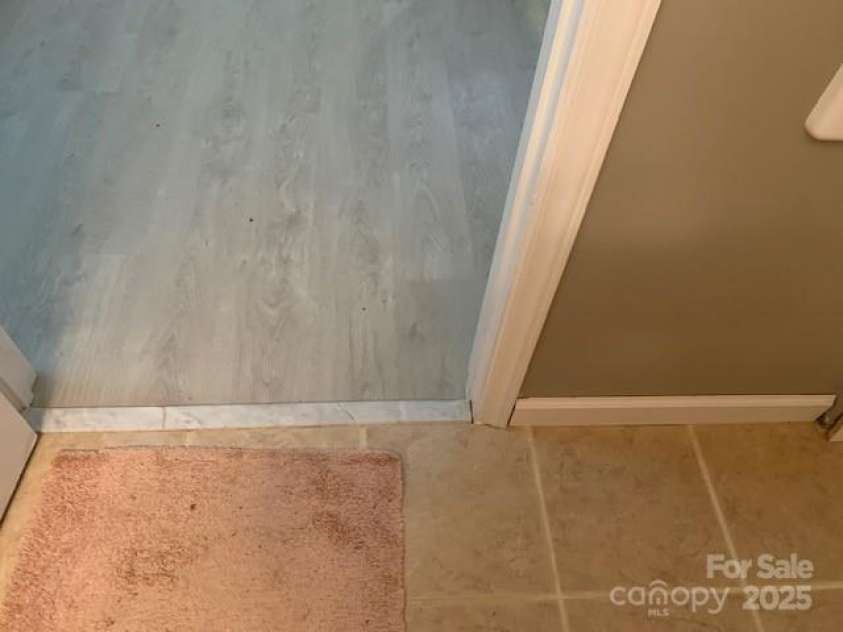 1474 HOLIDAY Drive, Hendersonville, NC 28739.  MLS# CAR4242849, YatesRealty ID 236. COUPLE YRS OLD VINYL PLANK FLOOR & CERAMIC