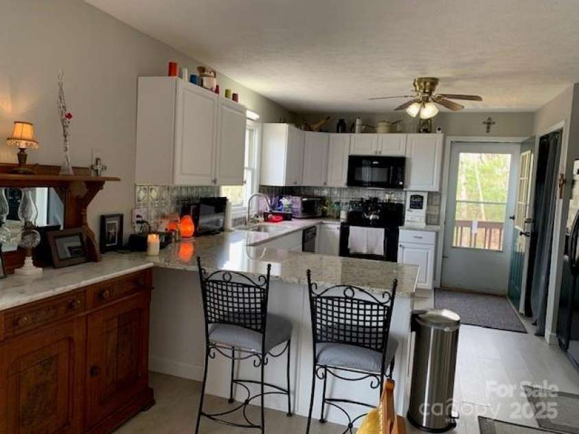 1474 HOLIDAY Drive, Hendersonville, NC 28739.  MLS# CAR4242849, YatesRealty ID 236. ENJOY THE PARTIES ... FROM THE CENTRAL SOCIAL SPOT ... TO THE NEW FAVORITE 