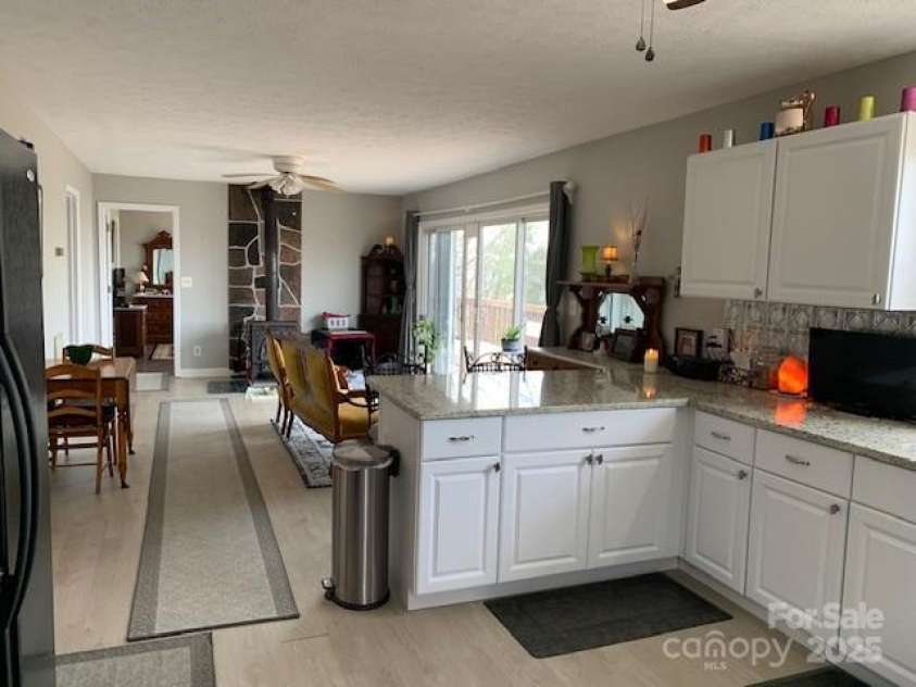 1474 HOLIDAY Drive, Hendersonville, NC 28739.  MLS# CAR4242849, YatesRealty ID 236. LOOK AT ALL THE GRANITE, AND NEWER CABINETRY AND FLOORING AND PAINT