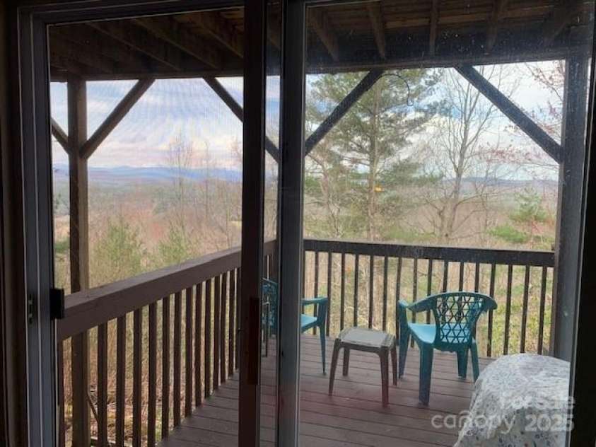 1474 HOLIDAY Drive, Hendersonville, NC 28739.  MLS# CAR4242849, YatesRealty ID 236. LOWER LEVEL DECK