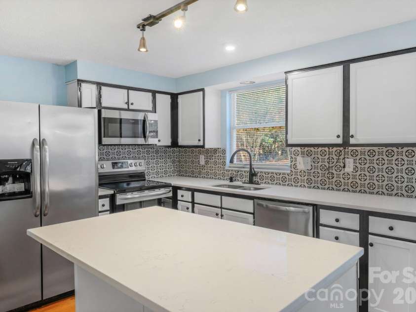 12006 Woodside Falls Road, Pineville, NC 28134.  MLS# CAR4336658, YatesRealty ID 2360. 