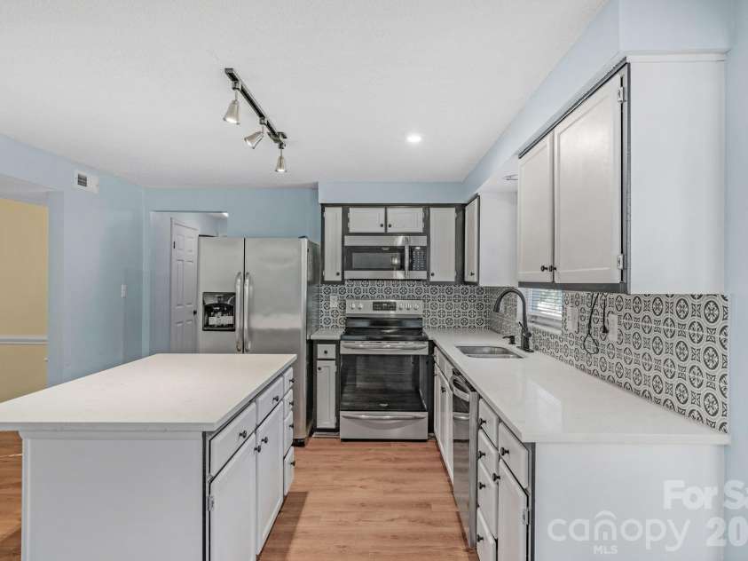 12006 Woodside Falls Road, Pineville, NC 28134.  MLS# CAR4336658, YatesRealty ID 2360. 