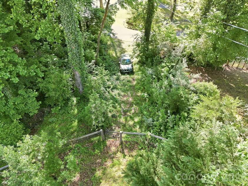 150 Pacolet Street, Tryon, NC 28782.  MLS# CAR4380448, YatesRealty ID 23603. 