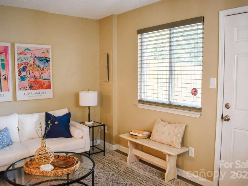 7526 Holly Grove Court, Charlotte, NC 28227.  MLS# CAR4269368, YatesRealty ID 23603. Door on the right leads to the backyard.