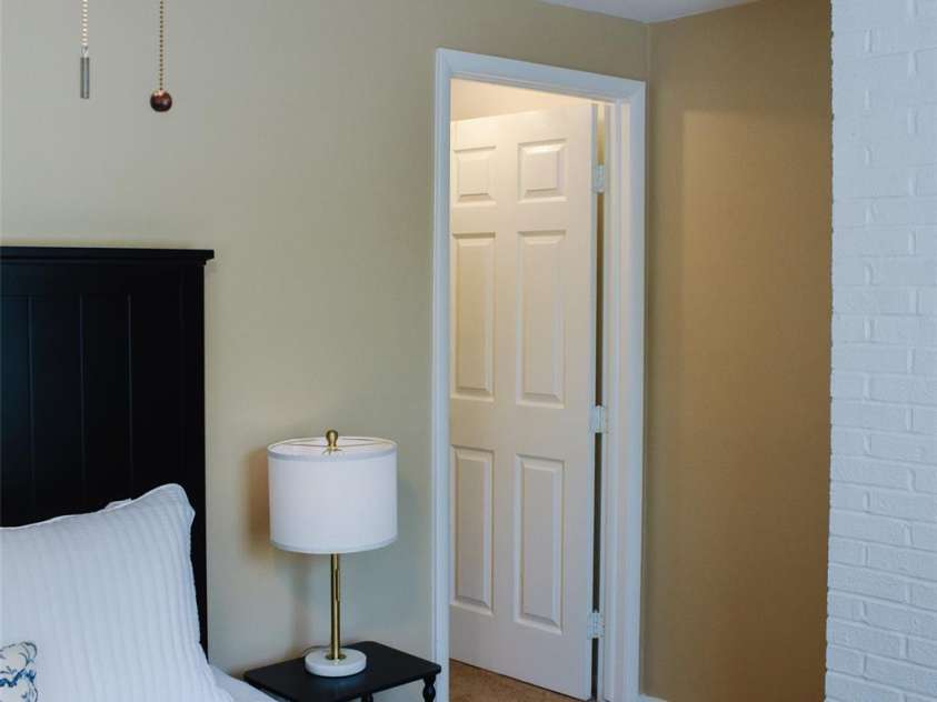 7526 Holly Grove Court, Charlotte, NC 28227.  MLS# CAR4269368, YatesRealty ID 23603. Entrance to primary walk in closet on the far right