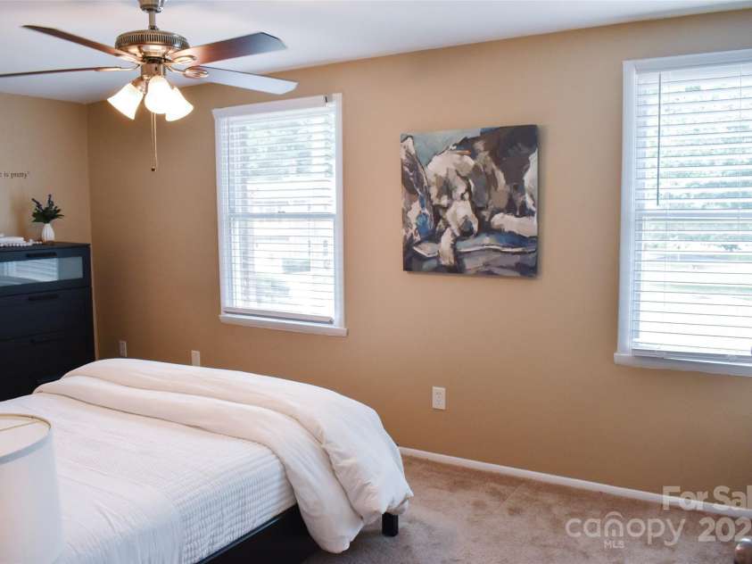 7526 Holly Grove Court, Charlotte, NC 28227.  MLS# CAR4269368, YatesRealty ID 23603. Spacious primary bedroom.