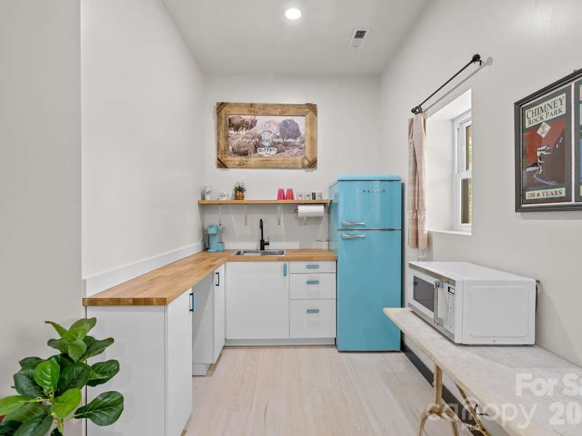 186 Sea Wish Way, Lake Lure, NC 28746.  MLS# CAR4364300, YatesRealty ID 23604. A bright and functional kitchenette in the studio apartment.