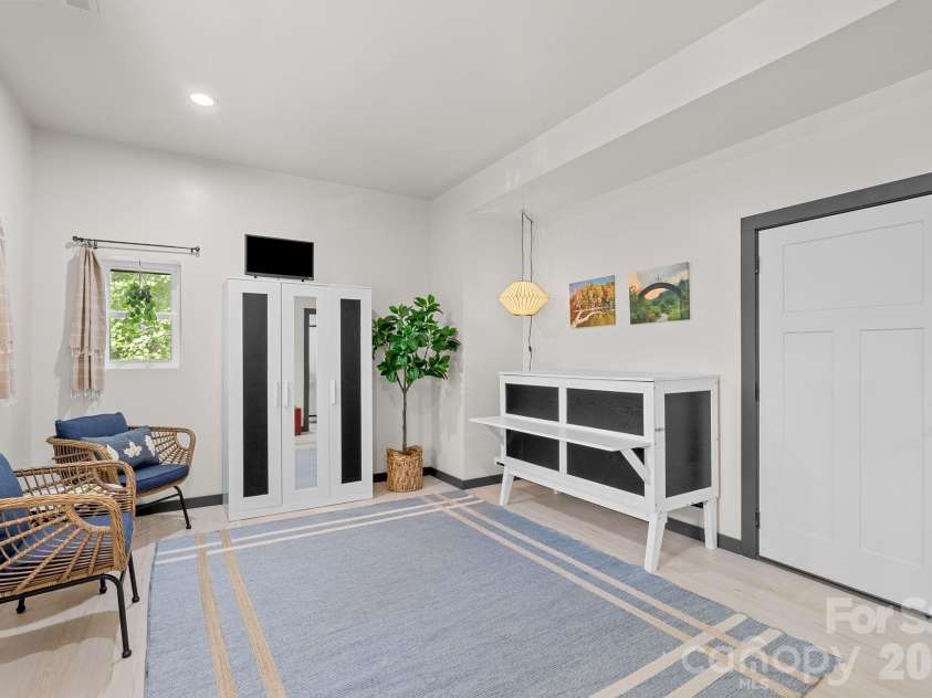 186 Sea Wish Way, Lake Lure, NC 28746.  MLS# CAR4364300, YatesRealty ID 23604. Step inside the studio apartment downstairs. 