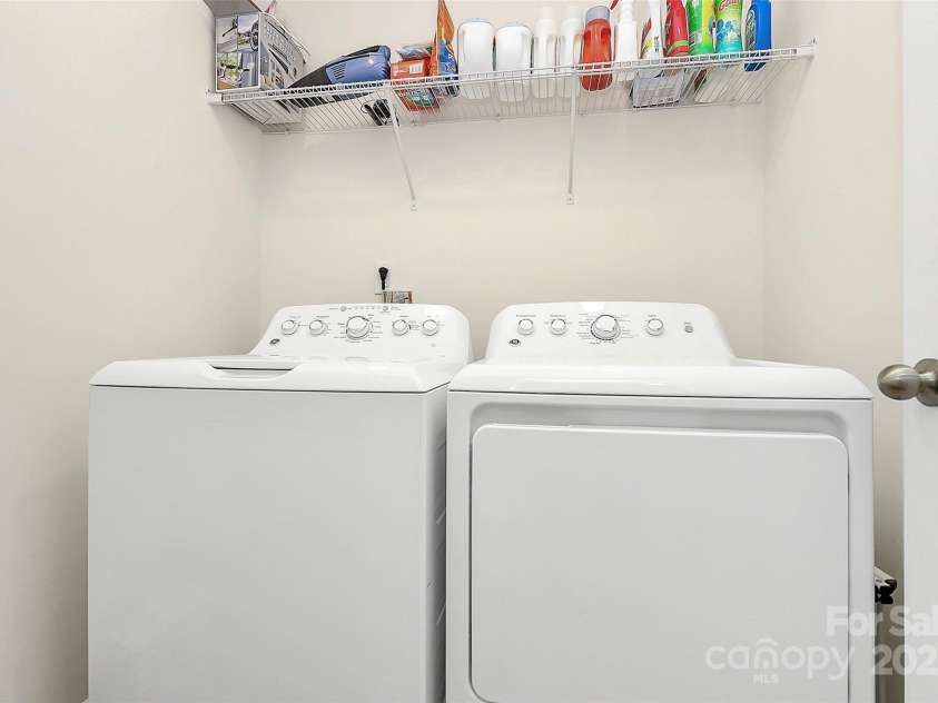 139 Suggs Mill Drive, Mooresville, NC 28115.  MLS# CAR4272116, YatesRealty ID 23610. Conveniently located on the second floor near the bedrooms—including the primary suite—this laundry room makes laundry day easier with quick, easy access just steps away from where you need it most.