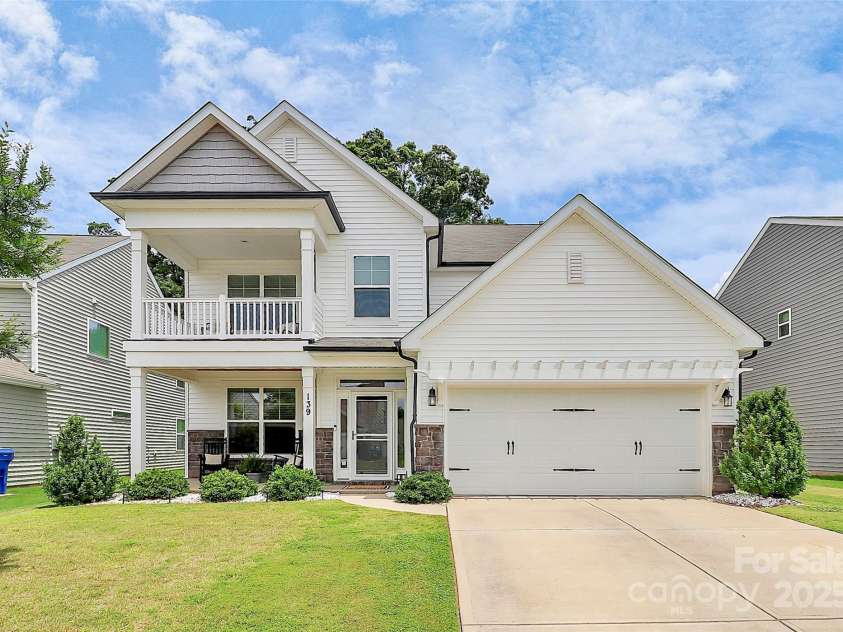139 Suggs Mill Drive, Mooresville, NC 28115.  MLS# CAR4272116, YatesRealty ID 23610. Discover the perfect blend of space and style in this stunning 3-story home!