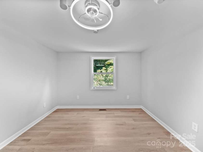 285 Baney Drive, Lexington, NC 27292.  MLS# CAR4275526, YatesRealty ID 23617. Back secondary bedroom