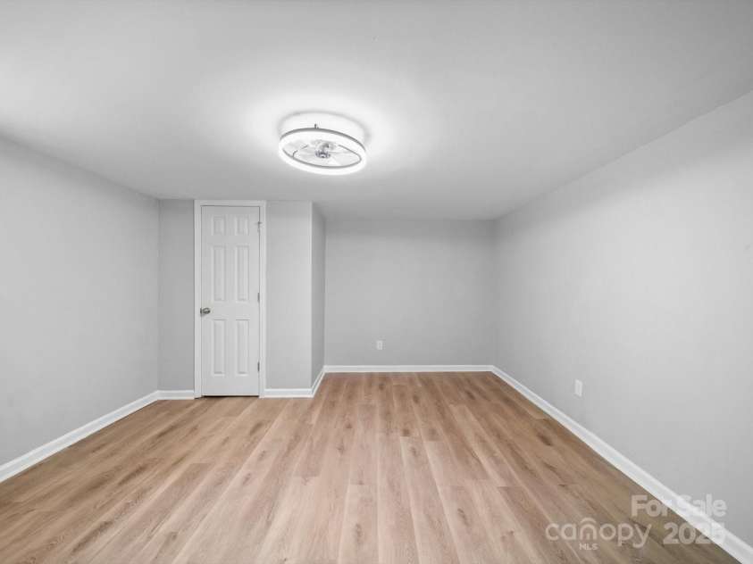 285 Baney Drive, Lexington, NC 27292.  MLS# CAR4275526, YatesRealty ID 23617. Front secondary bedroom