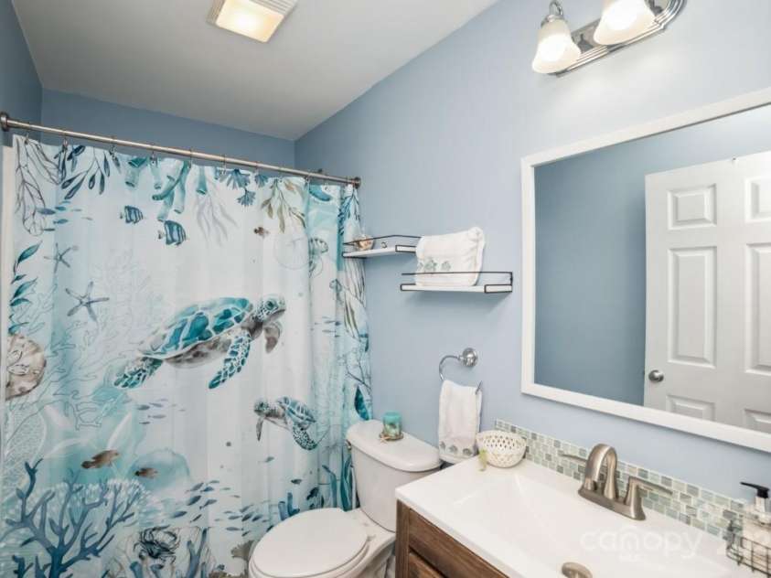 181 Brook Glen Drive, Mooresville, NC 28115.  MLS# CAR4274376, YatesRealty ID 23620. Hall Bathroom