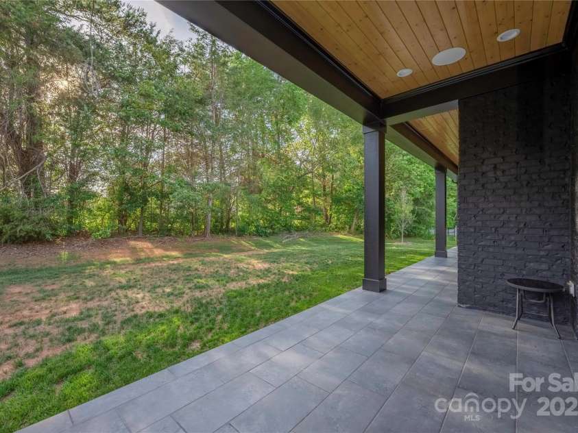10119 Laurier Lane, Huntersville, NC 28078.  MLS# CAR4273565, YatesRealty ID 23623. Back Yard Home of Future Pool
