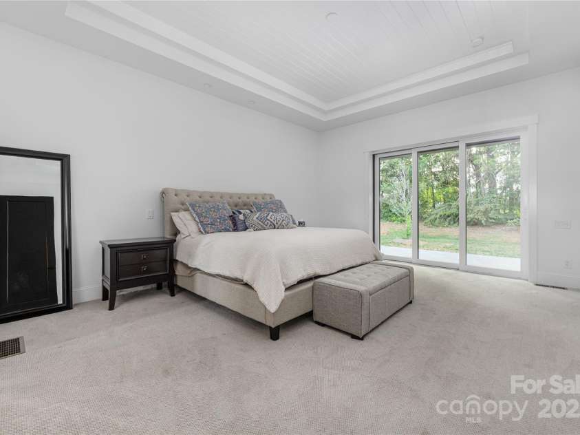 10119 Laurier Lane, Huntersville, NC 28078.  MLS# CAR4273565, YatesRealty ID 23623. Main Floor Primary Bedroom
