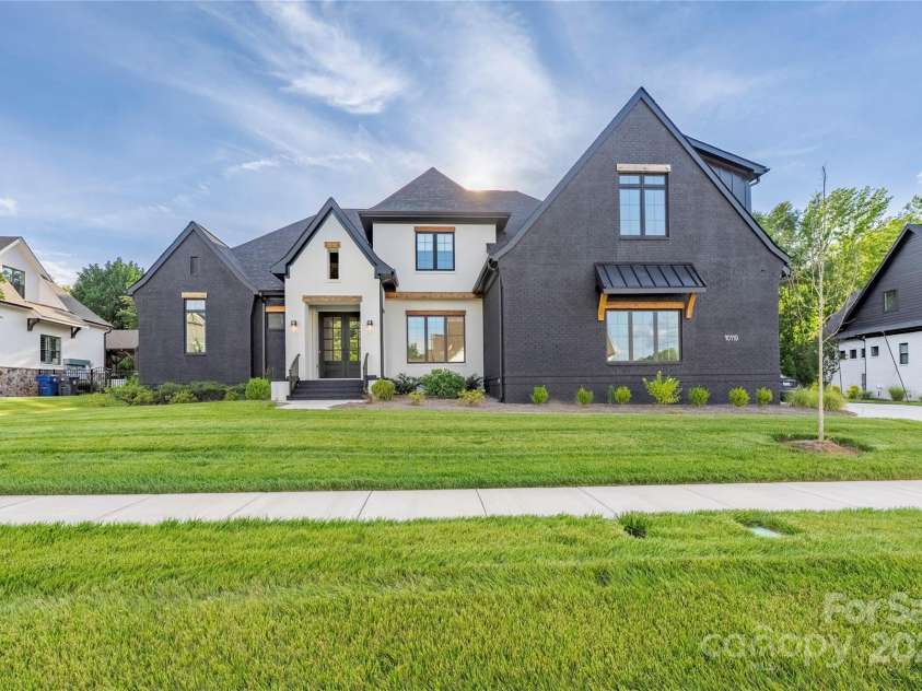 10119 Laurier Lane, Huntersville, NC 28078.  MLS# CAR4273565, YatesRealty ID 23623. Modern Black & White Front Exterior