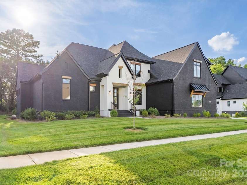 10119 Laurier Lane, Huntersville, NC 28078.  MLS# CAR4273565, YatesRealty ID 23623. Modern Black & White Front Exterior